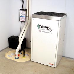 An ENERGY STAR® Rated basement dehumidifier installed in a home in