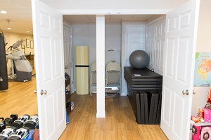 Basement Closet with Column TBF finished basement with home gym in Lowell